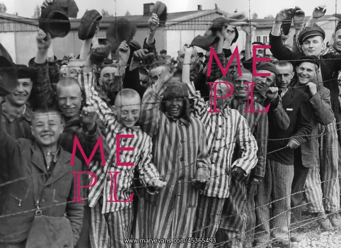 : Dachau Prisoners wave and cheer the Seventh US Army : Dachau Prisoners wave and cheer the Seventh US Army