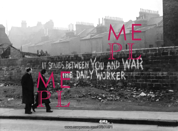 : Daily Worker slogan on a wall : Daily Worker slogan on a wall