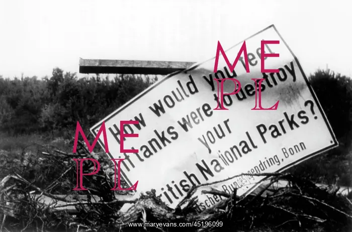 : Damaged sign against the devastation of nature by British tr : Damaged sign against the devastation of nature by British tr