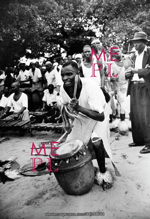 : One of the dancer plays the nzoma drum during the Mngeniso : One of the dancer plays the nzoma drum during the Mngeniso