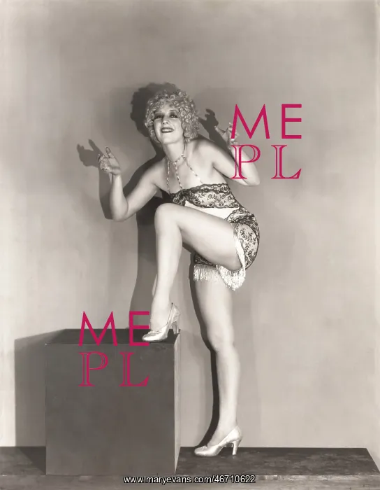 : Dancer posing with her leg up on large wooden block : Dancer posing with her leg up on large wooden block