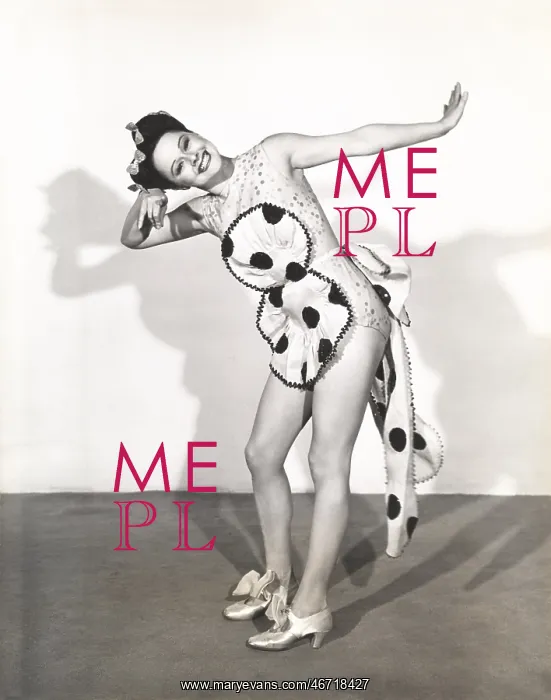 : Dancer posing in polka dot apron : Dancer posing in polka dot apron