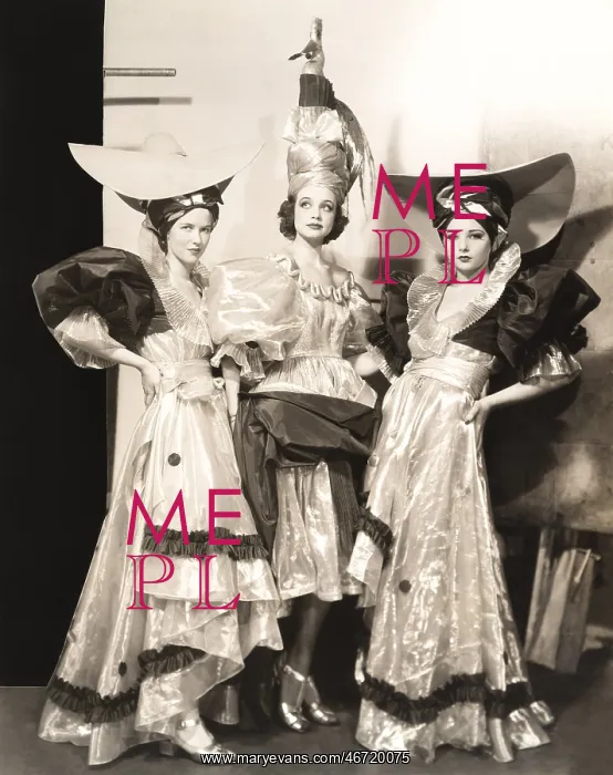 : Three dancers in long dresses and large hats : Three dancers in long dresses and large hats