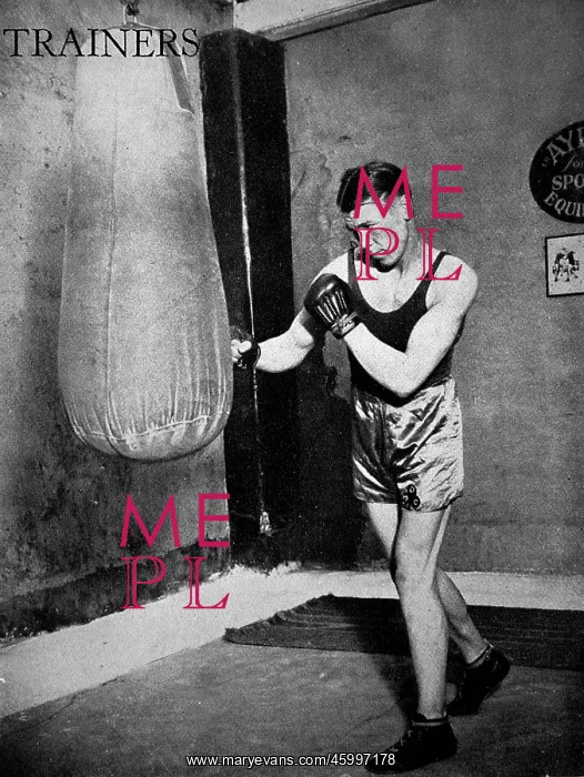 : Dave McCleave using a punch bag, 1936 : Dave McCleave using a punch bag, 1936