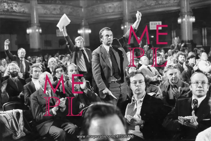 : David Owen at a conference, wishing to speak : David Owen at a conference, wishing to speak