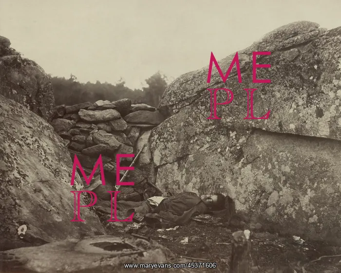 : A dead Confederate soldier lies in the Devils : A dead Confederate soldier lies in the Devils