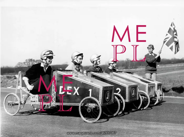 : Debutantes Prepare for Soap Box Race : Debutantes Prepare for Soap Box Race