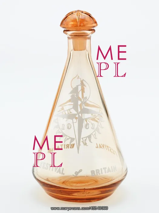 : Decanter. Tangerine coloured glass decanter of conical form : Decanter. Tangerine coloured glass decanter of conical form