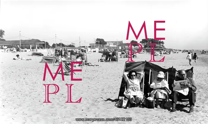 : Deckchairs on beach at an English seaside resort : Deckchairs on beach at an English seaside resort