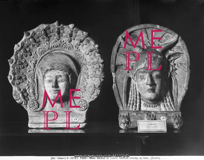 : Two decorations with heads of : Two decorations with heads of