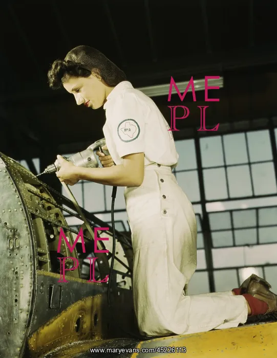 : Defense worker riveting as part of her training ? : Defense worker riveting as part of her training ?