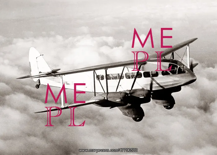 : DeHavilland biplane airliner in flight, 1934