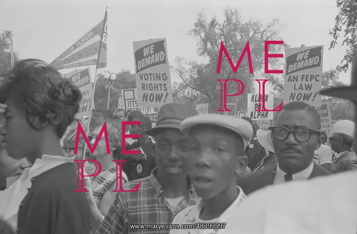 : Demonstrators holding signs during the March : Demonstrators holding signs during the March