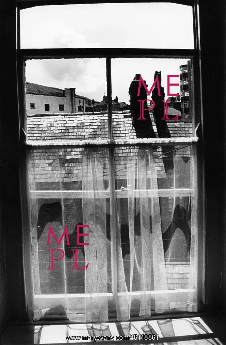 : Derelict urban view through a window with net curtain : Derelict urban view through a window with net curtain