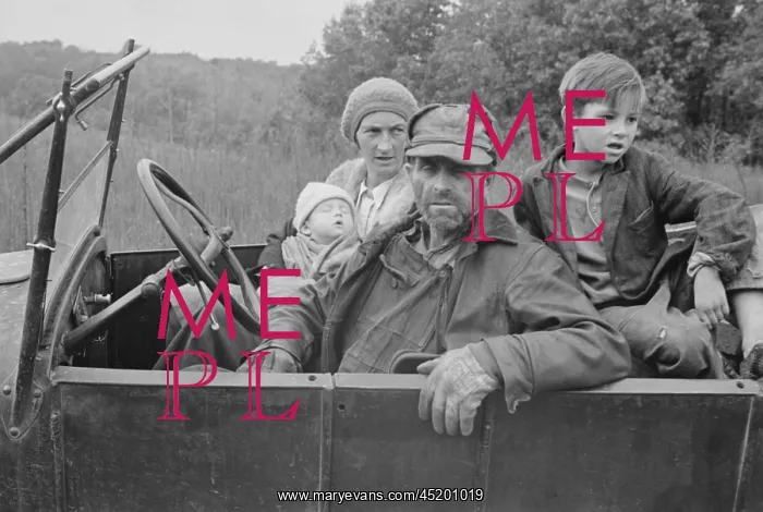 : A destitute family with their old car in ? : A destitute family with their old car in ?