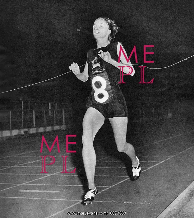 : Diane Leather winning the mile race : Diane Leather winning the mile race