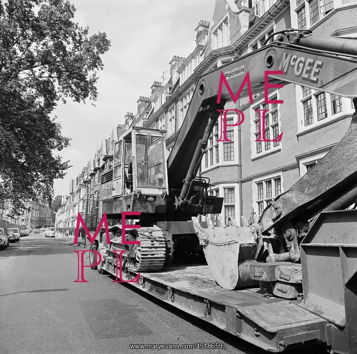 : Digger on a truck : Digger on a truck
