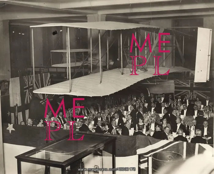 : Dinner held by the RAeS under the original 1903 Wright Flyer : Dinner held by the RAeS under the original 1903 Wright Flyer