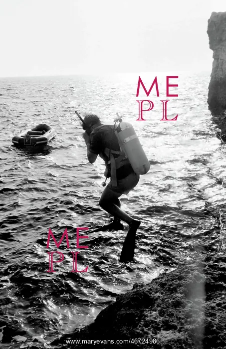 : Diver jumping into the sea off the coast of Malta : Diver jumping into the sea off the coast of Malta