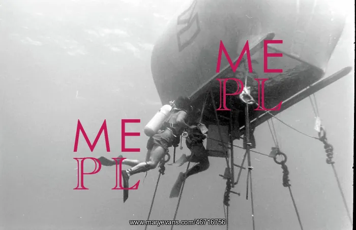 : Divers with underwater house off the coast of Malta : Divers with underwater house off the coast of Malta