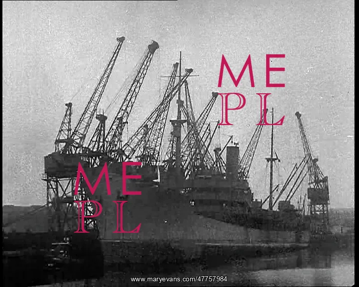 : A Docked Cargo Ship Being Unloaded : A Docked Cargo Ship Being Unloaded