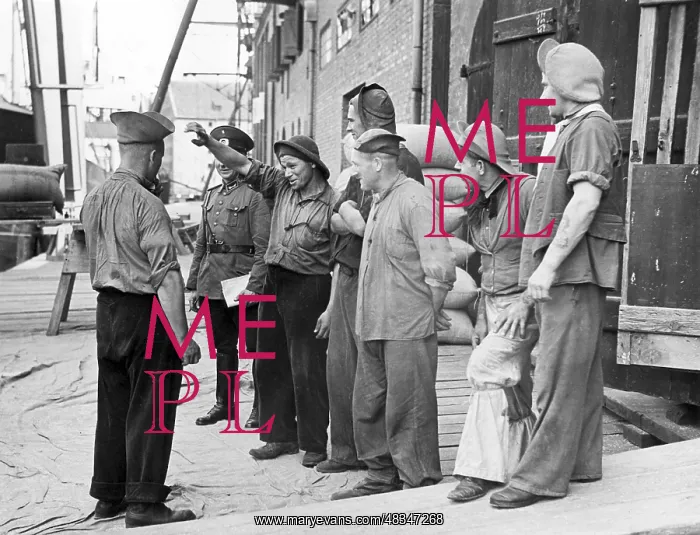 : Dockers taking a break in Gdansk, 1939 : Dockers taking a break in Gdansk, 1939