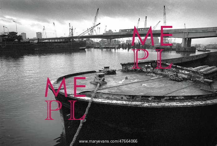 : Docklands development, London, England - barge and Dockland : Docklands development, London, England - barge and Dockland