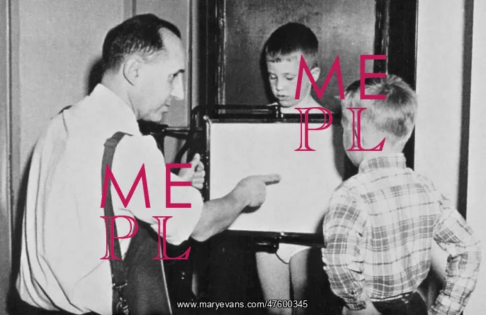 : Doctor Explains Fluoroscope to Young Boy : Doctor Explains Fluoroscope to Young Boy