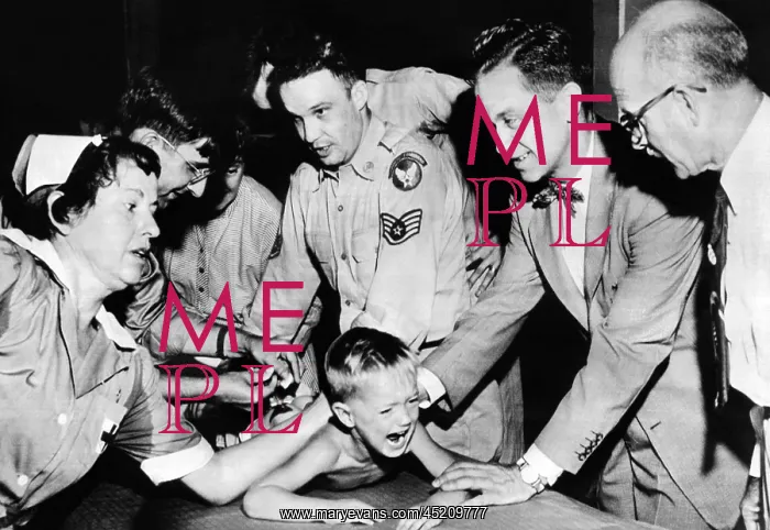 : Several doctors and nurses restrain young ? : Several doctors and nurses restrain young ?