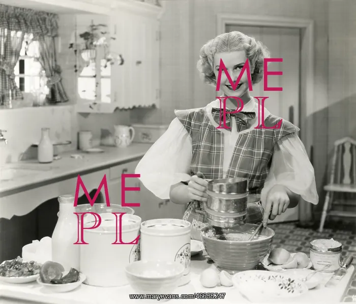  : Domestic goddess baking in the kitchen -