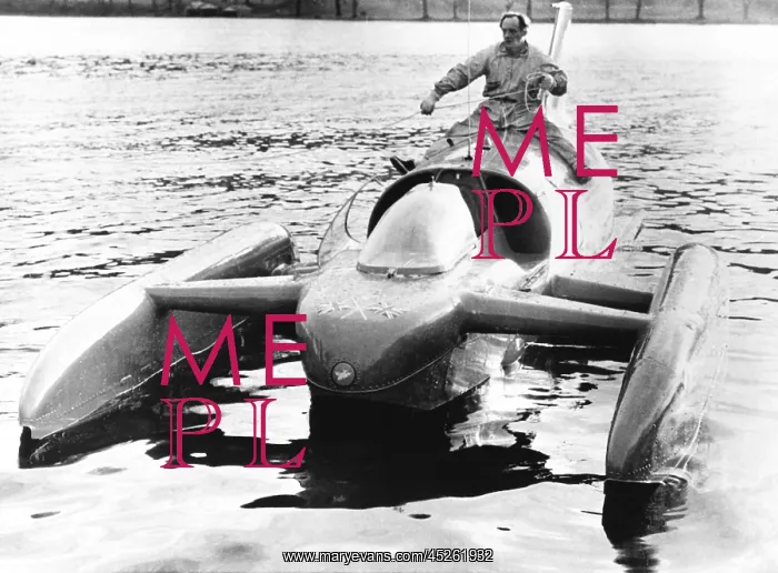 : Donald Campbell sits astride his jet powered boat : Donald Campbell sits astride his jet powered boat