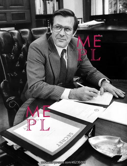 : DONALD RUMSFELD, working in his office after ? : DONALD RUMSFELD, working in his office after ?