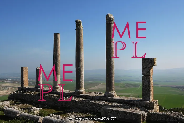 : Dougga. Low angle view of a row of columns from the Temple of Saturn, built around 200 A.D : Dougga. Low angle view of a row of columns from the Temple of Saturn, built around 200 A.D