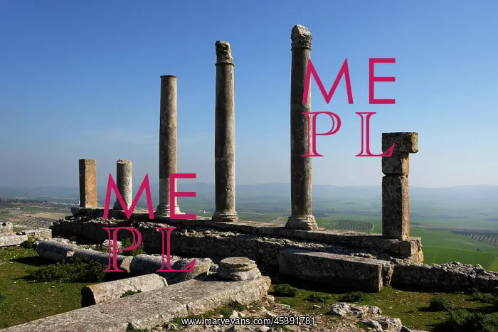 : Dougga. Low angle view of a row of columns from the Temple of Saturn, built around 200 A.D : Dougga. Low angle view of a row of columns from the Temple of Saturn, built around 200 A.D