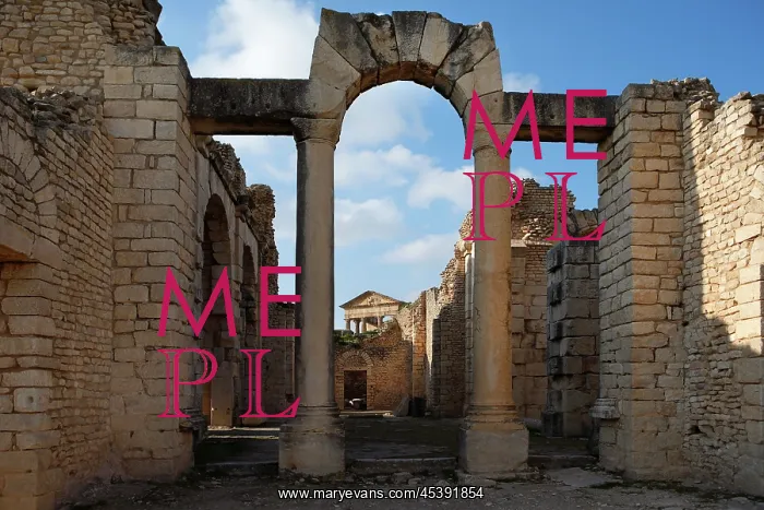 : Dougga. Low angle view of arch in the Frigidarium in the Baths of Licinius : Dougga. Low angle view of arch in the Frigidarium in the Baths of Licinius