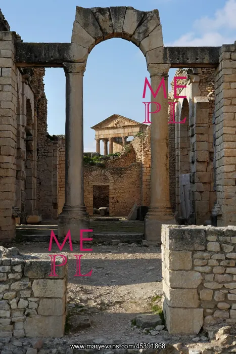 : Dougga. Low angle view of an arch in the Frigidarium of the Baths of Licinius : Dougga. Low angle view of an arch in the Frigidarium of the Baths of Licinius