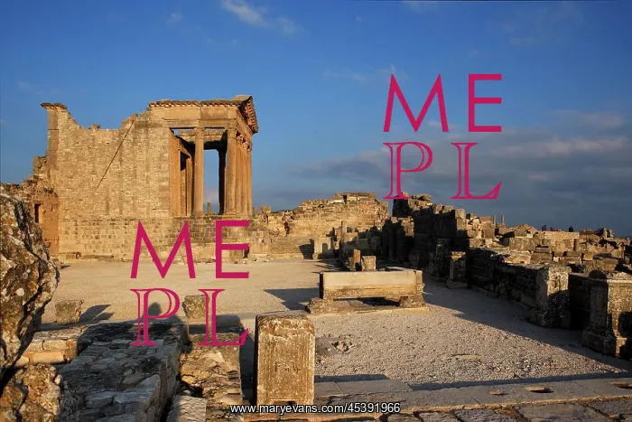 : Dougga. Low angle view of the Forum with the Capitol in the background : Dougga. Low angle view of the Forum with the Capitol in the background