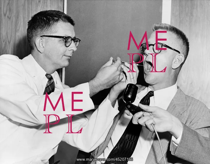 : Dr. Harry L. Williams squirts LSD from a ? : Dr. Harry L. Williams squirts LSD from a ?