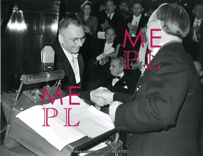 : Dr Hugh Dryden, left, is presented with his certificate : Dr Hugh Dryden, left, is presented with his certificate