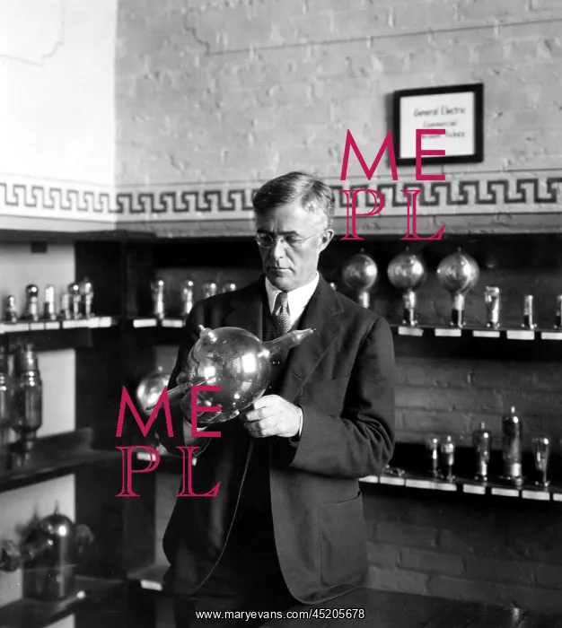 : Dr. IRVING LANGMUIR, associate director ? : Dr. IRVING LANGMUIR, associate director ?