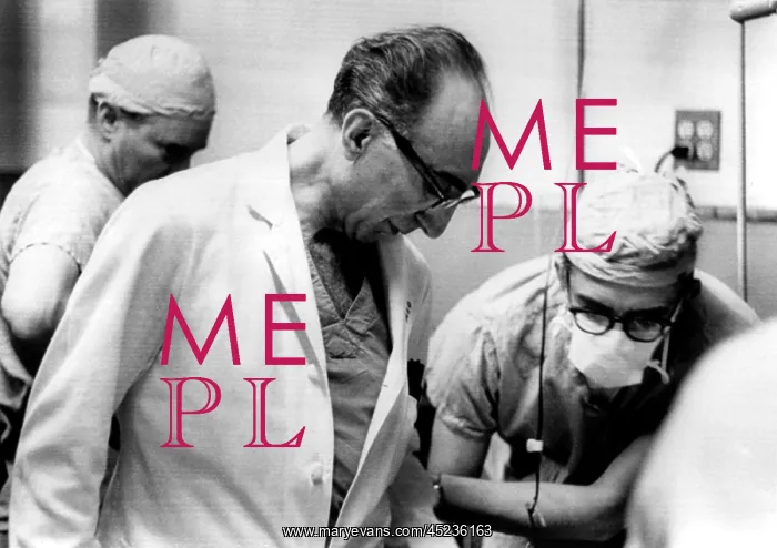 : Dr. Michael DeBakey examining his artificial ? : Dr. Michael DeBakey examining his artificial ?