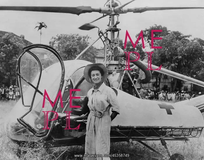 : Dr. Valerie Andre, in front of her helicopter in : Dr. Valerie Andre, in front of her helicopter in