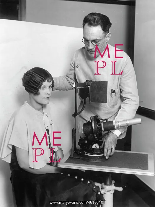 : Dr. William D. Redding with his machine : Dr. William D. Redding with his machine