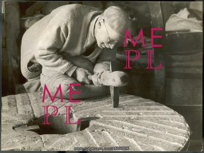 : DRESSING A MILLSTONE : DRESSING A MILLSTONE