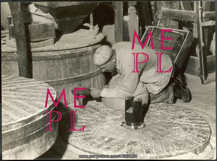 : DRESSING A MILLSTONE : DRESSING A MILLSTONE
