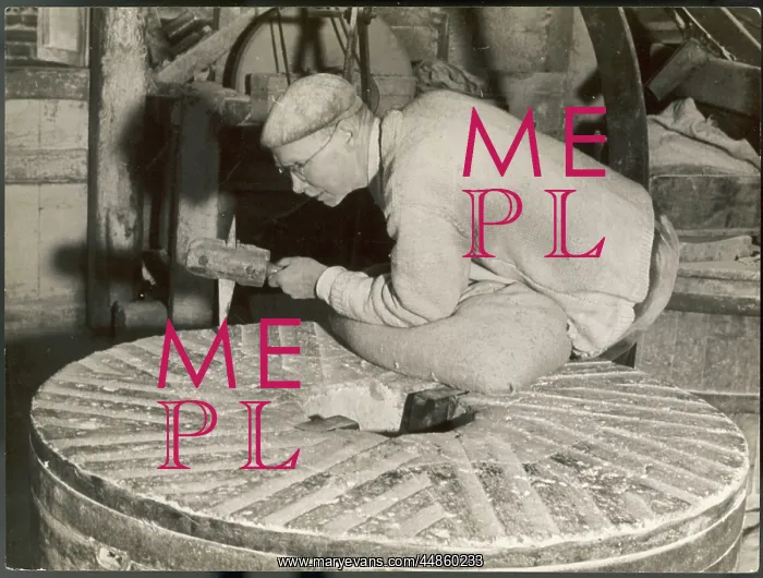 : DRESSING A MILLSTONE : DRESSING A MILLSTONE