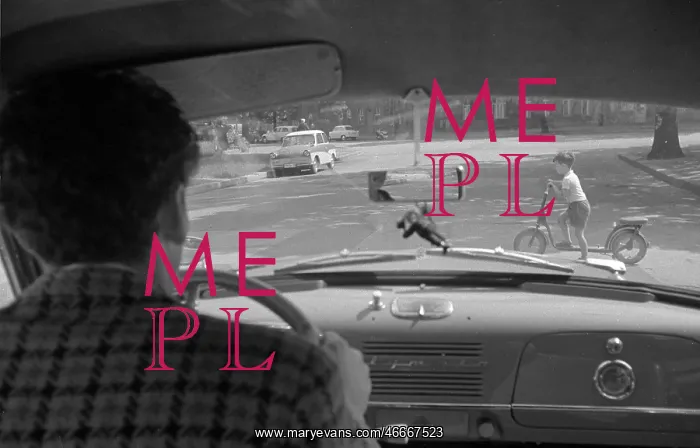 : Driving a car 1960s : Driving a car 1960s