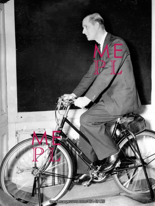: Duke of Edinburgh, Prince Philip, testing a bicycle : Duke of Edinburgh, Prince Philip, testing a bicycle
