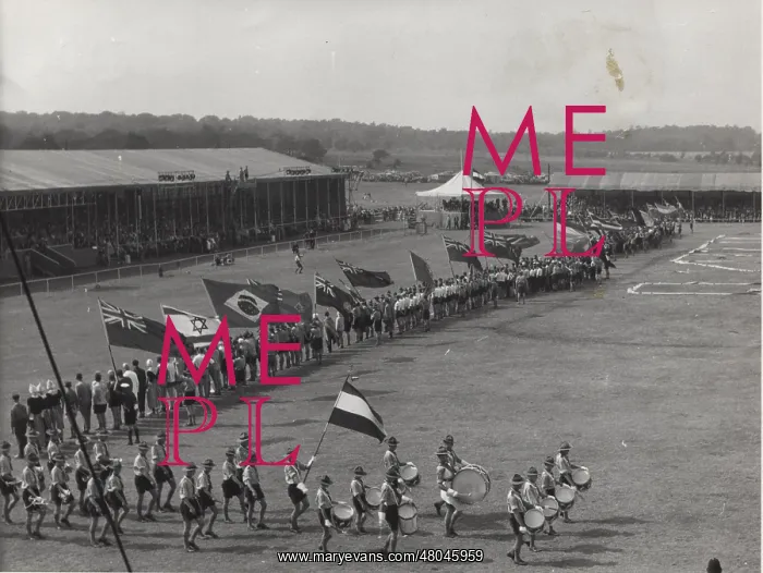 : Dutch boy scouts on a parade ground with flags : Dutch boy scouts on a parade ground with flags