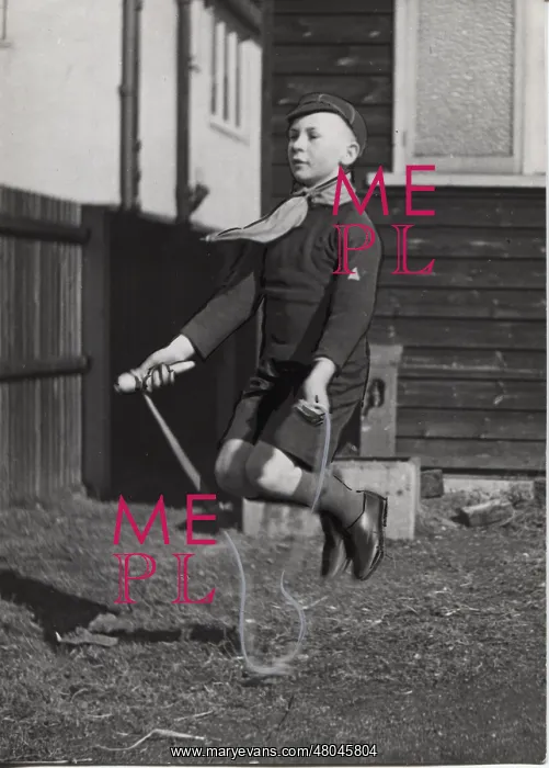: Dutch cub scout skipping with a rope, Netherlands : Dutch cub scout skipping with a rope, Netherlands